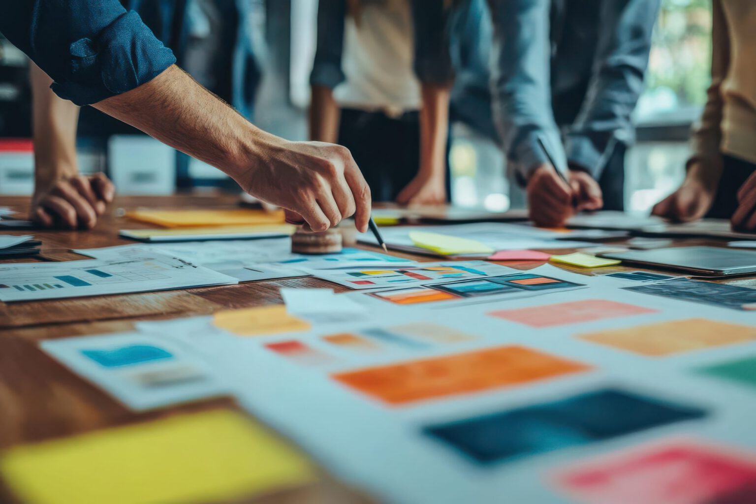 Team discussing project scope, office setting, planning