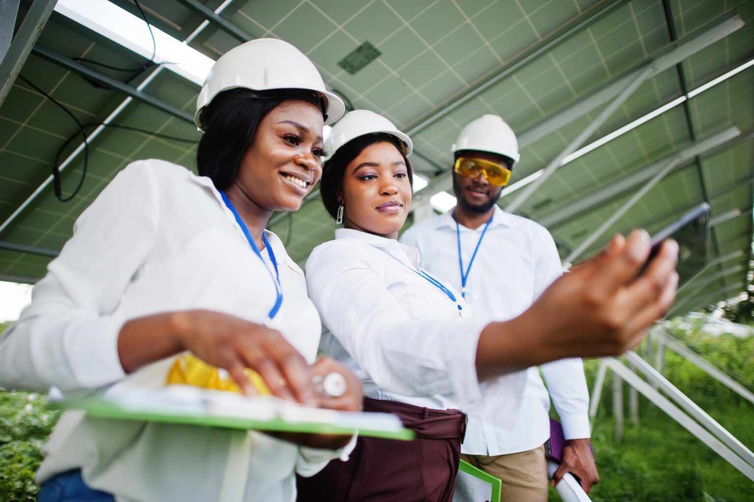 African american technician checks the maintenance of the solar