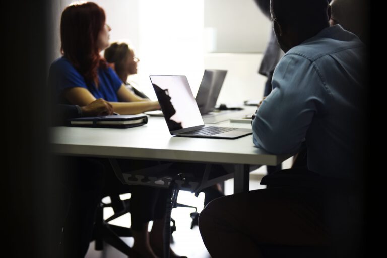 Group of diverse people attending startup business course