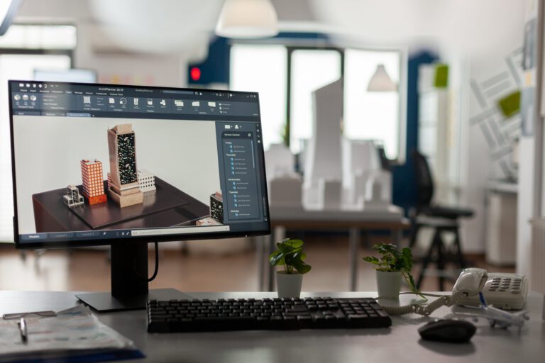 Computer display with 3d render software of architectural building complex