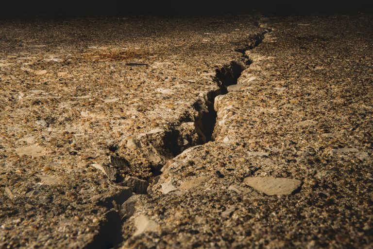 split-ground-covered-stones-sunlight (1)